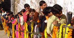 Pilgrims lineup to pay obeisance at  Shiv Khori.