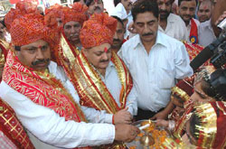 Lighting of lamp during inauguration ceremony.