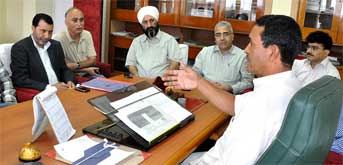 Minister for Tourism and Culture, J&K reviewing arragements for ATOAI convention in Sgrinagar, Kashmir