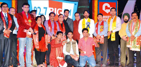 Participants with the Winners of All India Devotional Song Competition held during Navratra Celebrations