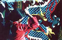A Carpet weaver in actions