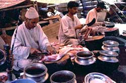 A view of waza (cooks) preparing Wazawan . 